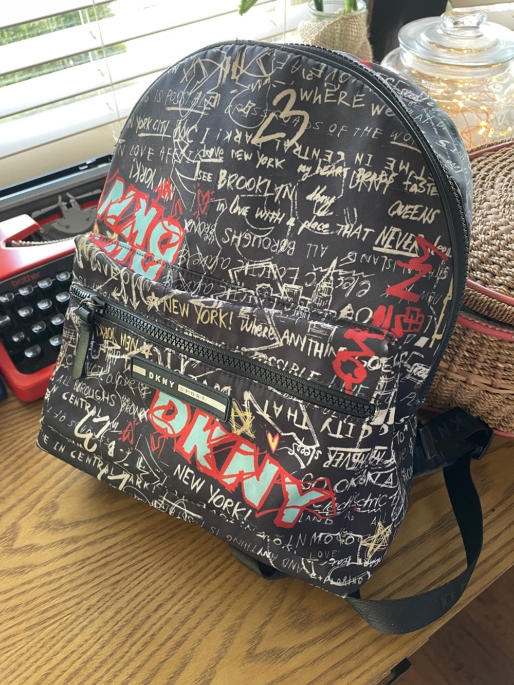 DKNY Black Backpack with Red and White Graffiti Print